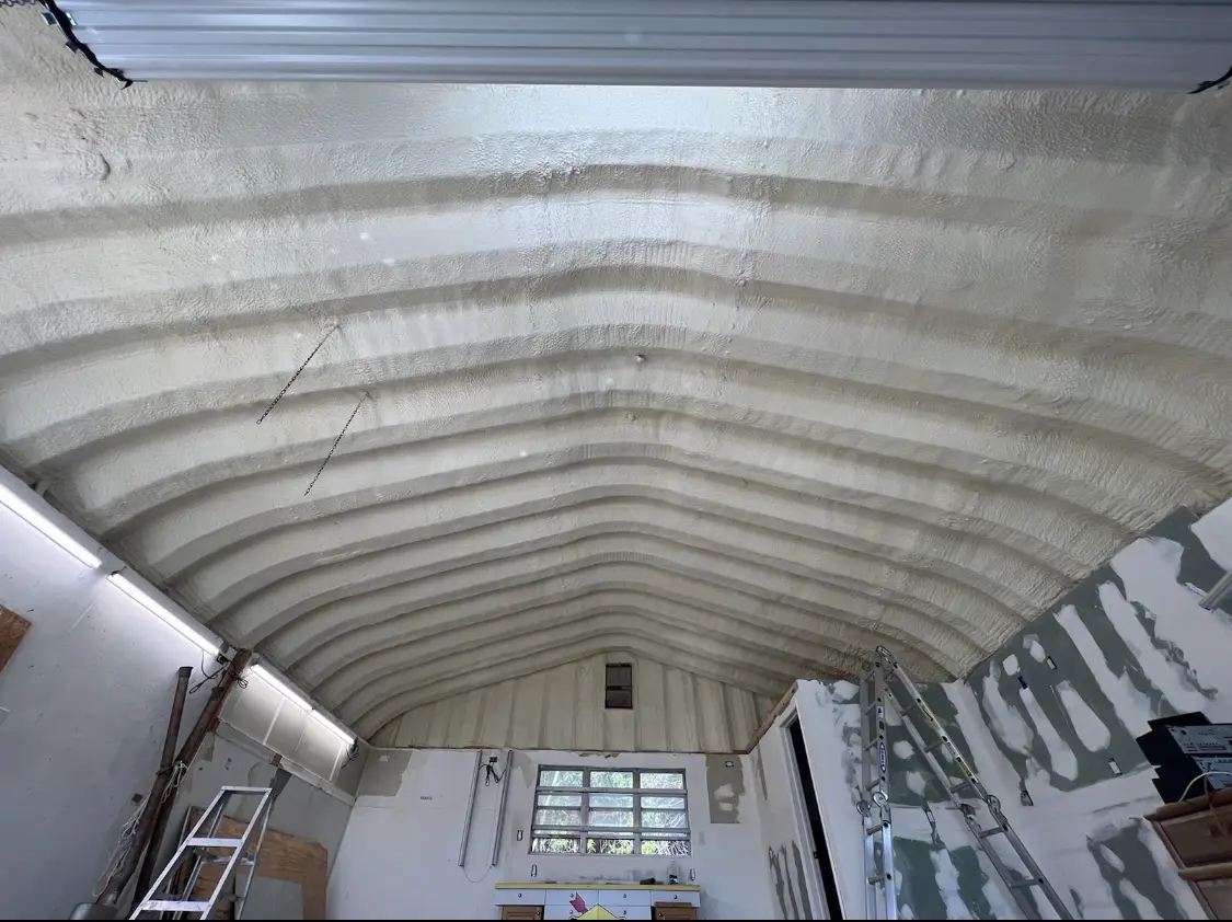 Spray polyurethane foam applied to the underside of a metal roof deck in Perrysburg